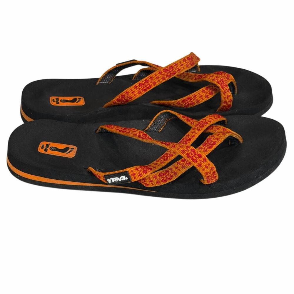 Teva size 6 women’s orange & black flip flops sandals